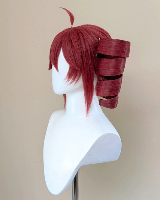 Side view of the Kasane Teto cosplay wig showing layered red bangs and a spiral twin tail