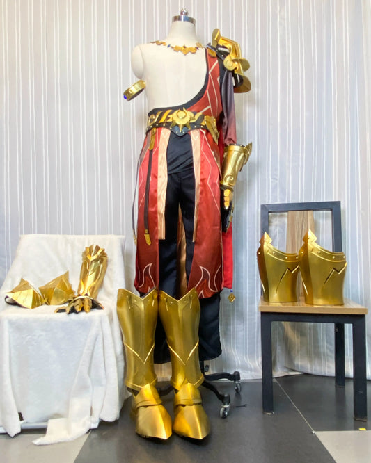 Front view of the Mydei Honkai Star Rail cosplay costume with red draped fabric, black trousers and gold armor