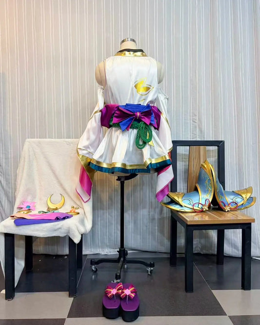 Back view of the Lux cosplay costume showing the white outfit, multicolored waist bow and matching shoes