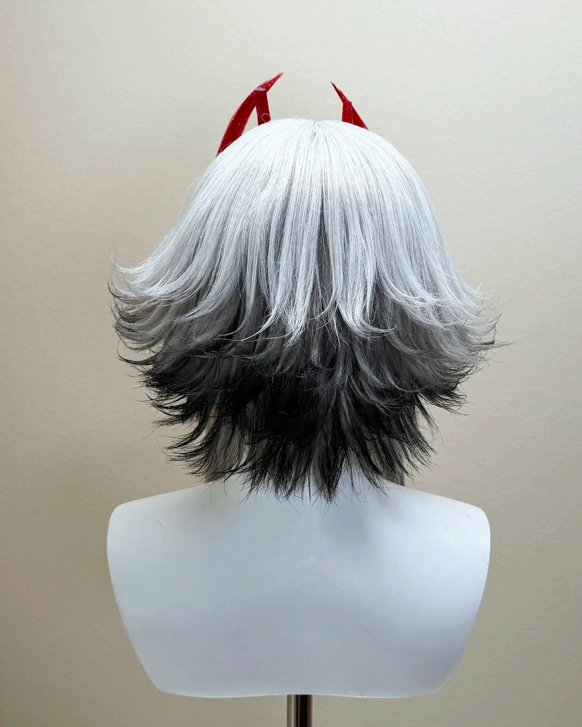 Back view of the Arknights wig showing silver-gray layers and outward-flipped dark ends