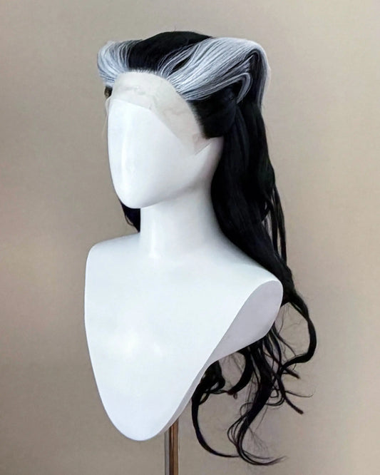 Side view of the Renata Glasc cosplay wig showing the silver swept hairline and long black curls